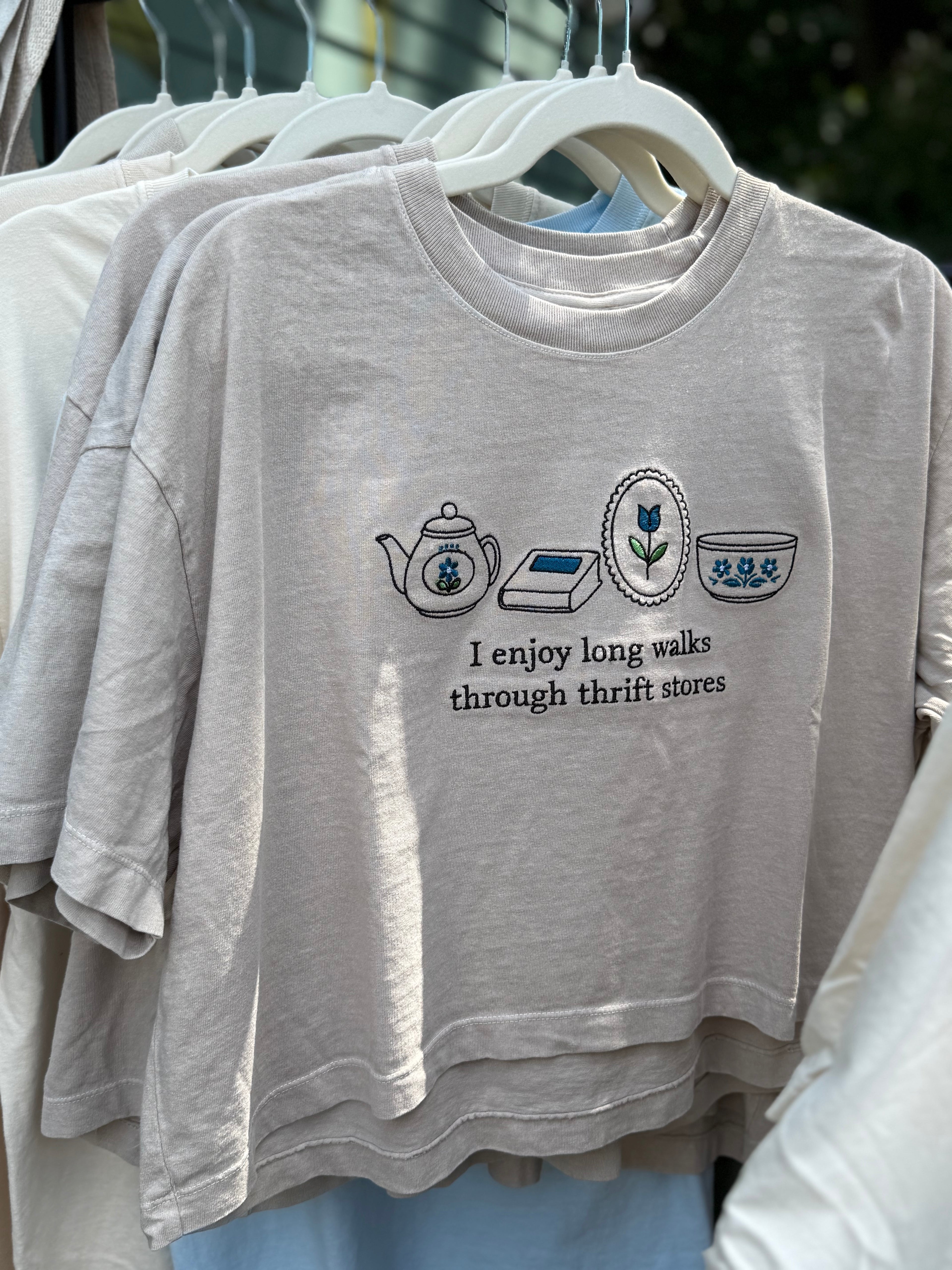 I Enjoy Long Walks Through Thrift Stores Cropped Tee